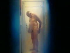 Well hung old man having a shower